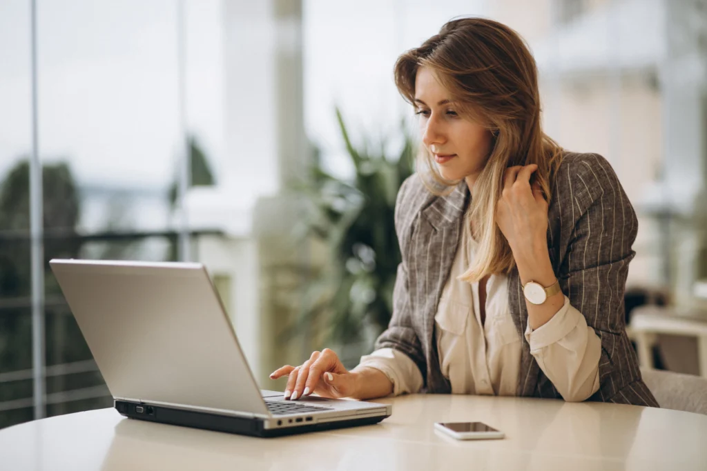 portrait business woman working laptop