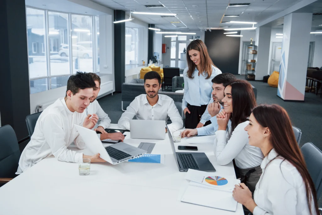 showing good results group young freelancers office have conversation smiling (2)